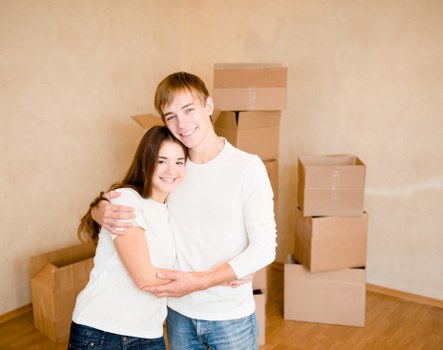 Packed boxes and protected furniture ready for a local relocation