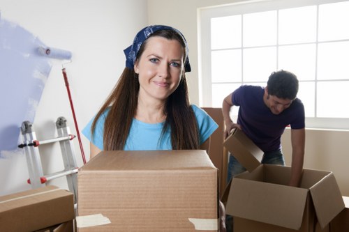 Packing and transporting office furniture and files for a Holland Park move