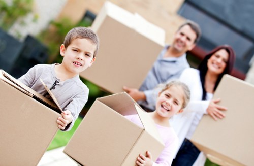 Local team collecting sofas and beds from a Holland Park flat