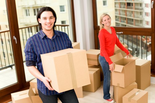Business furniture being handled carefully during a local West London relocation