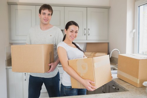 Packed boxes and furniture ready for a residential relocation in West London